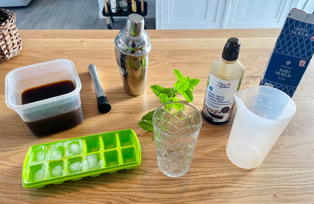 The items needed to make a Mint Mojito Iced Coffee.