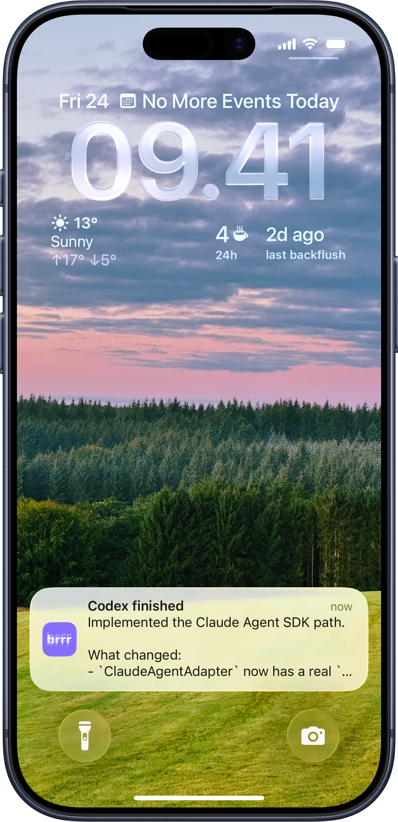 iPhone lock screen showing a brrr notification that Codex finished a task.